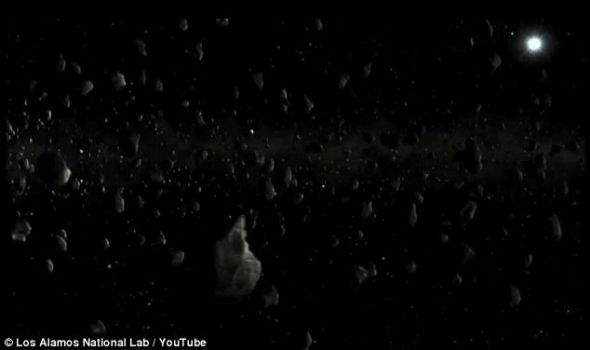 核爆炸后，小行星被分解成無(wú)數(shù)太空碎石。